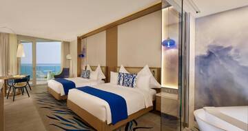 Фото номера Стандартный номер с балконом и 2 двуспальными кроватями Отель Paragraph Resort &amp; Spa Shekvetili, Autograph Collection г. Шекветили 2